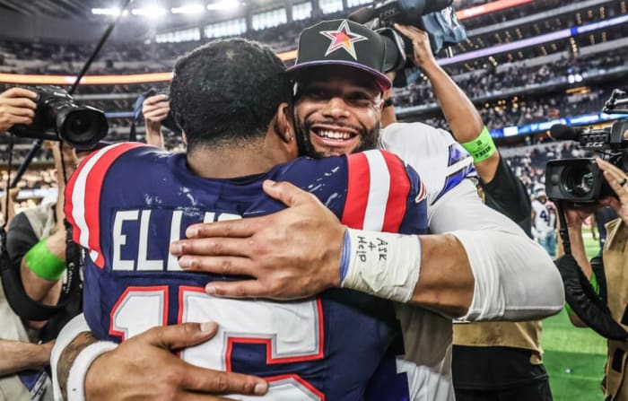 Dak Prescott shares a hug with former Dallas Cowboys teammate and close friend Ezekiel Elliott (USA TODAY SPORTS)